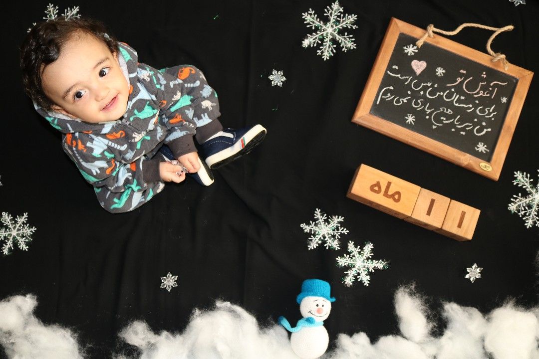 تم عکس زمستانی نوزاد امیرعباس خواجه عمید