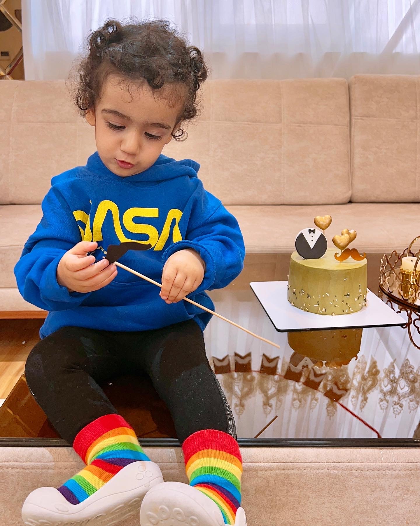 عکس نوزاد با پدر دلوین قلی نژاد