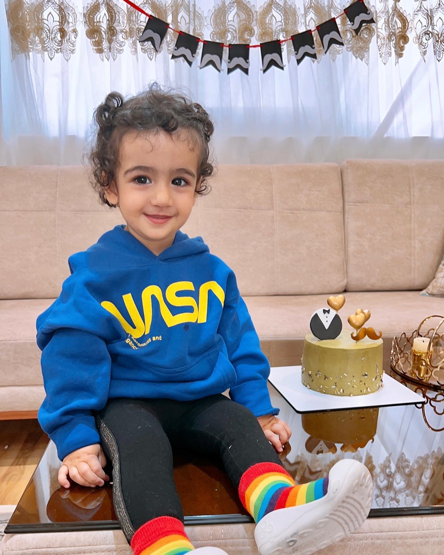 عکس نوزاد با پدر دلوین قلی نژاد