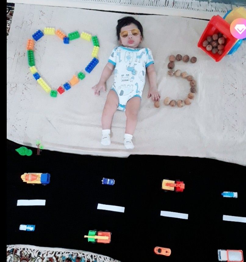 تم عکس پاییزی نوزاد ماهان دریس